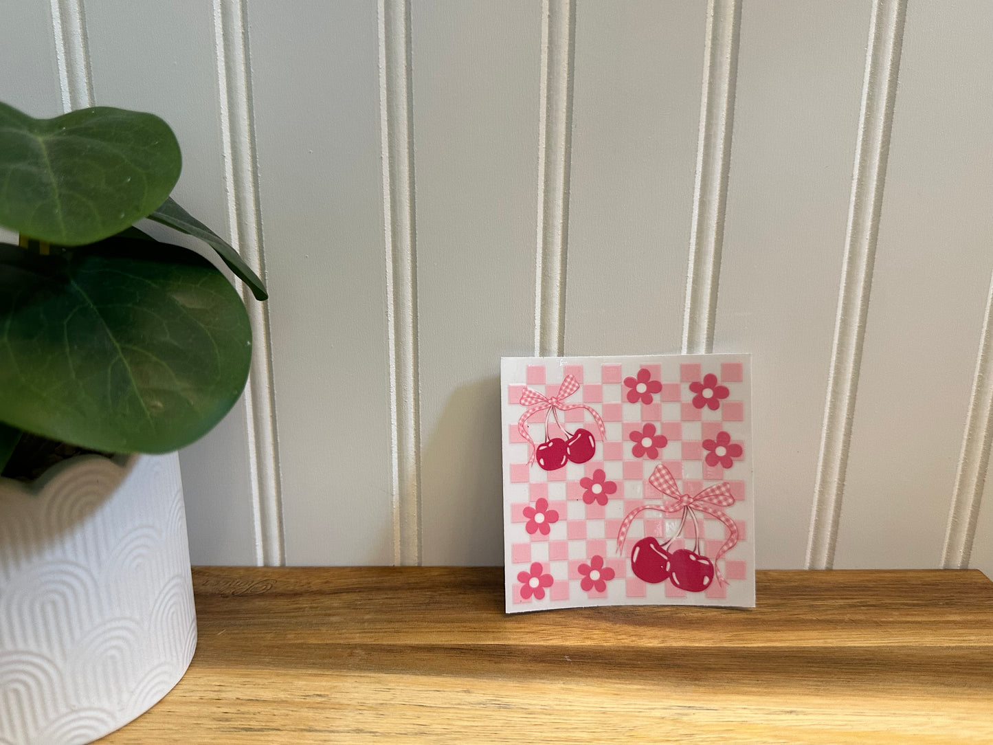 pink checked cherries with flowers